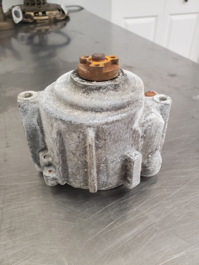 Before vapor honing pump body, oxidized aluminum and steel. Before vapor honing pump body, oxidized aluminum and steel.