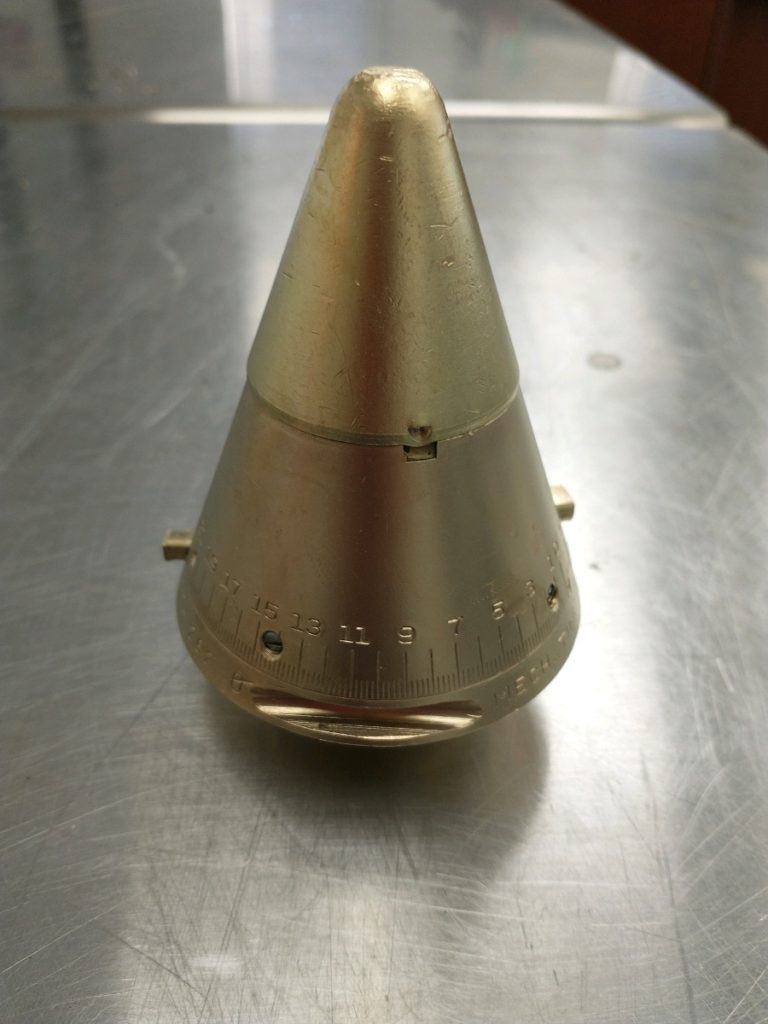 Decorative brass proximity fuse, after vapor honing Decorative brass proximity fuse, after vapor honing