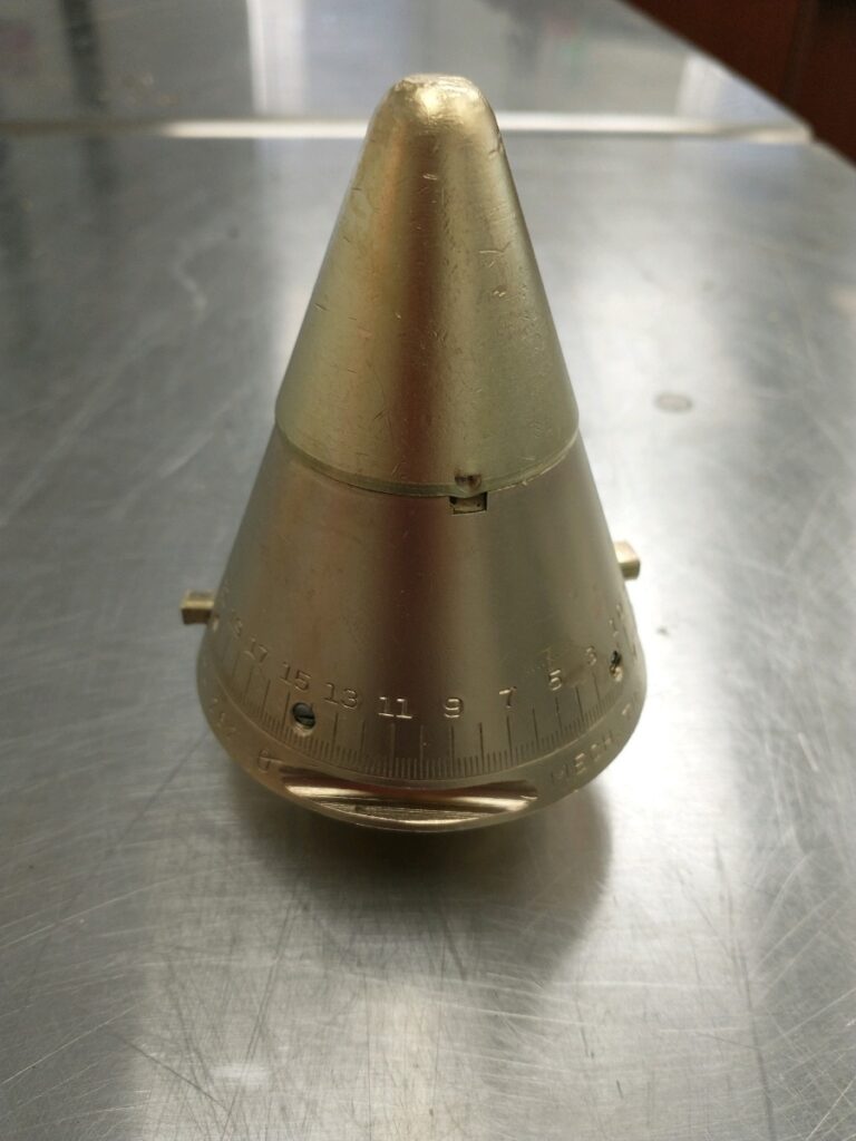 Decorative brass proximity fuse, after vapor honing