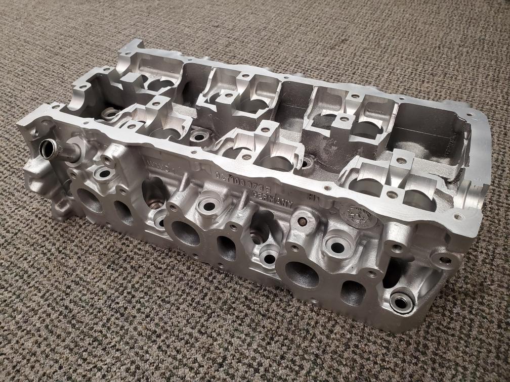 Aluminum cylinder head, after vapor honing Aluminum cylinder head, after vapor honing